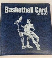 Blue basketball card album full of cards