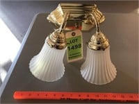 Ribbed glass globes on 2 bulb wall fixture