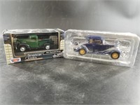 2 Diecast toys in boxes