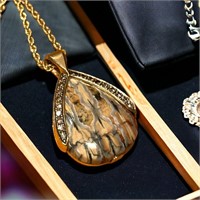 custom made petrified mammoth tooth necklace