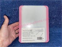 New Pampered Chef pink cutting board (plastic on)