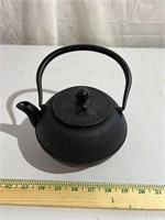 Cast-iron? Teapot.