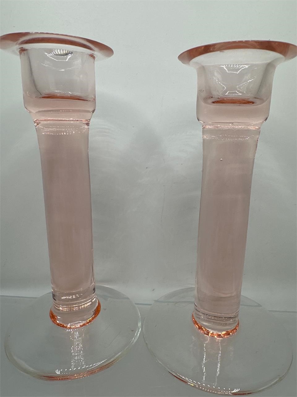 Pink glass candlestick holders