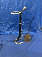 Horseshoe and hame ashtray stand and a cowbell