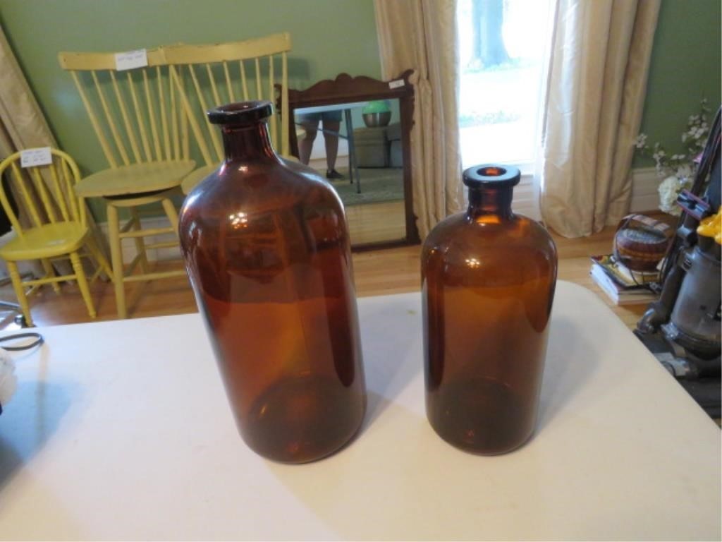 2 BROWN GLASS BOTTLES