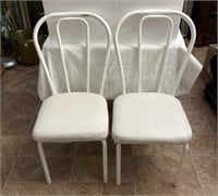 TWO white metal chairs. 17.75" floor to seat,