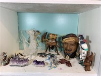 Shelf full of dragons and more