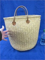 large weaved basket with handles