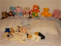 Stuffed animals, mostly bears, lamb, etc