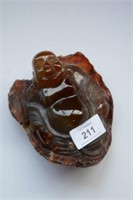 Carved agate figure of a happy Buddha,