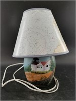 Lighthouse themed table lamp with nautical nightsh