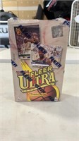 Lot of basketball cards factory sealed in box.