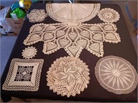 Offering Of Hand Crocheted Doilies.