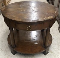 Baker furniture circular end table measuring 27”