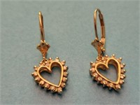Nice 10k leaverback diamond heart earrings....