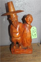 CARVED PILGRIM FIGURINE