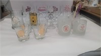 8 Purdue high ball glasses and 7 various alcohol