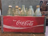 Vintage Coca-Cola wood tray with bottles