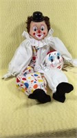 Plastic, wood, and fabric clown 24 inches long