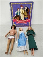 anastasia book and 3 barbie dolls