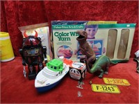 Battery operated robot, boat, dinosaurs.