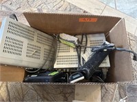 Box of misc direct TV hardware and remotes.