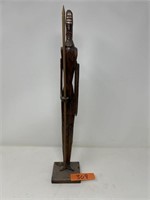 Wooden soldier sculpture.