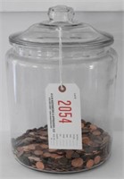 Lot #2054 - Glass covered jar full of pennies