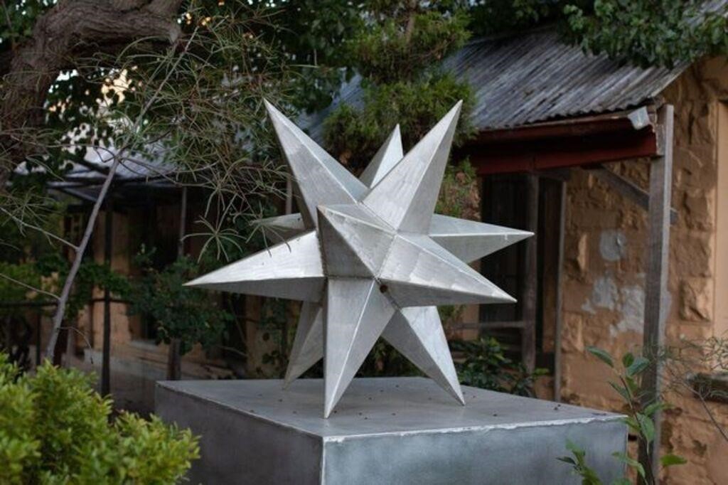 JUSTIN ZAHRA  STAR SCULPTURE ON LARGE ALUMINIUM