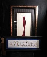 Framed print of a red dress measuring 28 x 48,