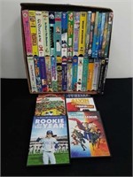 Group of VHS and DVD kids movies