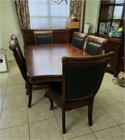 Wood Dining room table and leather chairs