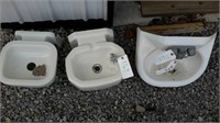 2 porcelain drinking fountains and a cast iron