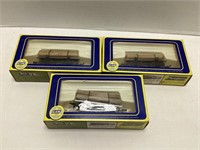 Three AHM HO Gauge Log Cars