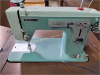 Seamstress sewing machine & cabinet. 30.5"h x