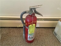 fire extinguisher still charged
