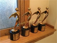 4 awards trophys Telly awards