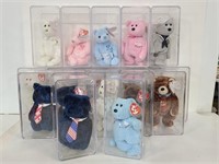 Eighteen display cases w/ Beanie Babies