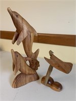 Wood dolphins and stingray