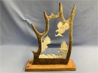 Beautiful moose antler carving of an eagle going f