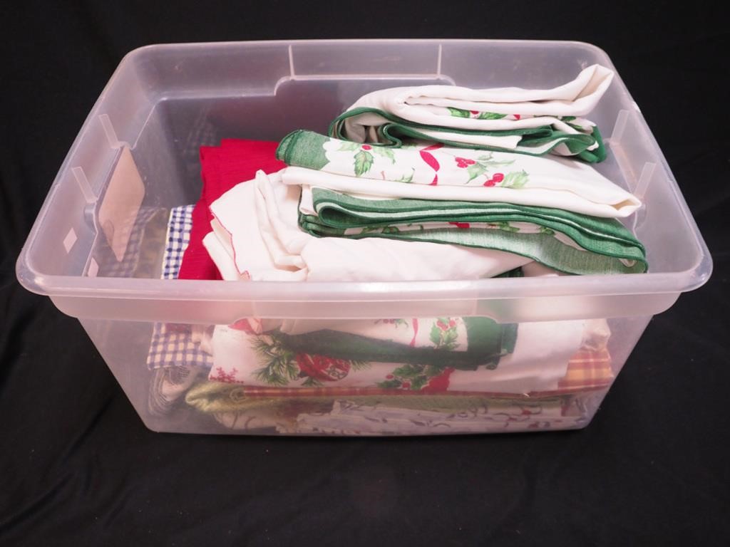 Container of vintage and contemporary tablecloths