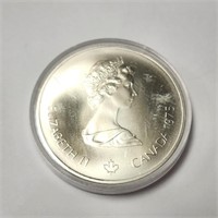 Silver Canada Olympia $10 48.34G Coin