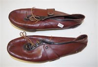 Pair of vintage leather spike running shoes
