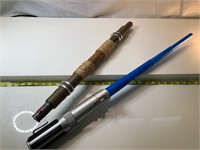 Two kids lightsabers