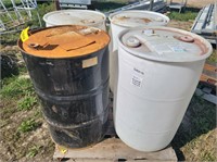 3 white plastic barrels & 1 steel barrel