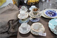 ASSORTED DEMITASSE CUPS AND SAUCERS -
