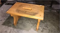 Oak footstool with center handle, 10 x 15 x 9,