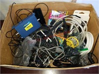 Lot of random power cords, cables, and chargers.