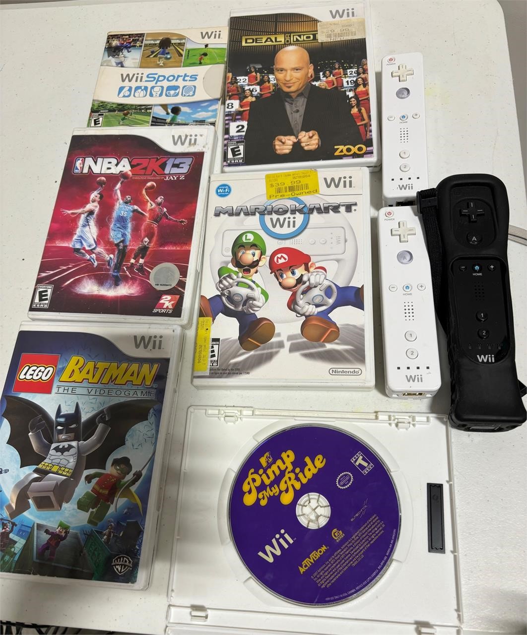 6 Wii games and 3 controllers