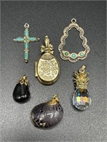 Six small jewelry pendants